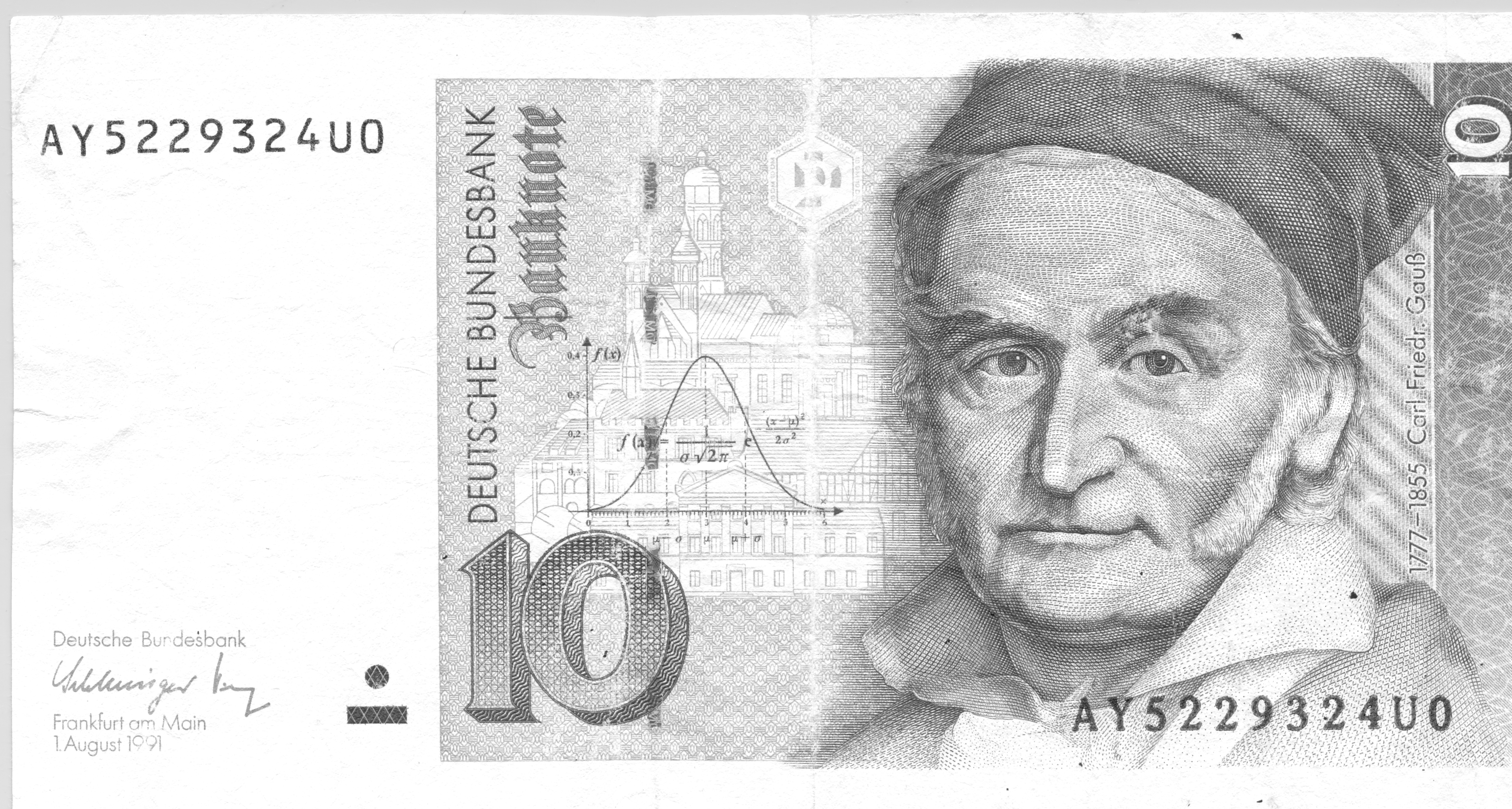 Ten Deutsche Mark. German currency featuring scientist Gauss and the normal curve.
